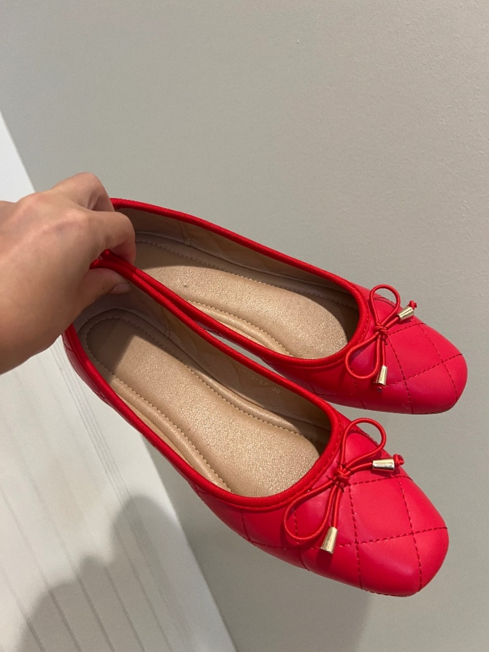 Red quilted ballet flats in EU size 39